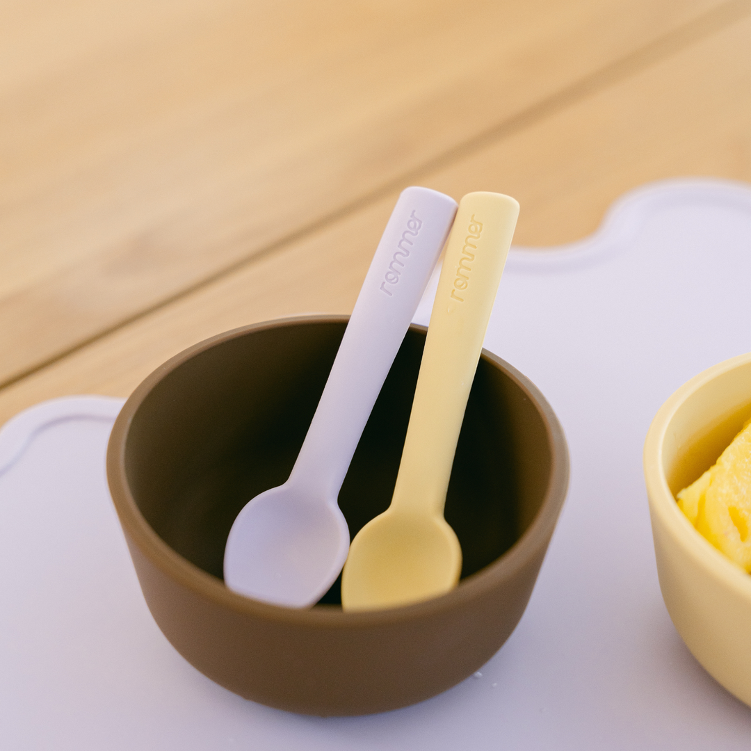 Children's silicon spoon in pastel orange
