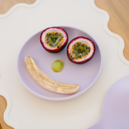 Rommer Lilac plate on Creme wiggly placemat